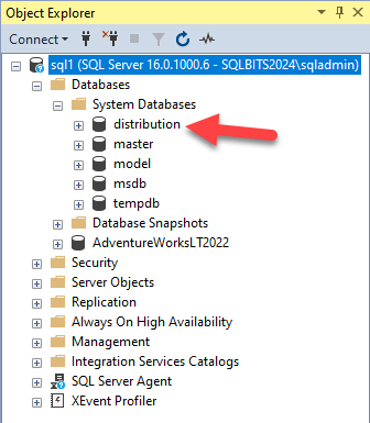SSMS connected to sql1 instance, showing that there is a distribution database now,