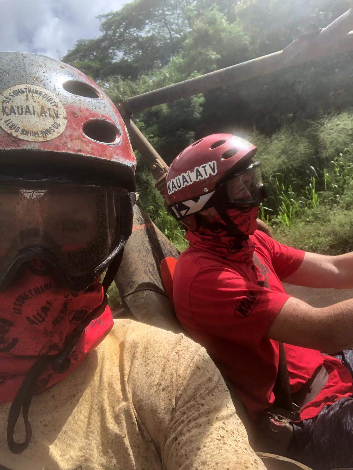 Muddy, driving an ATV